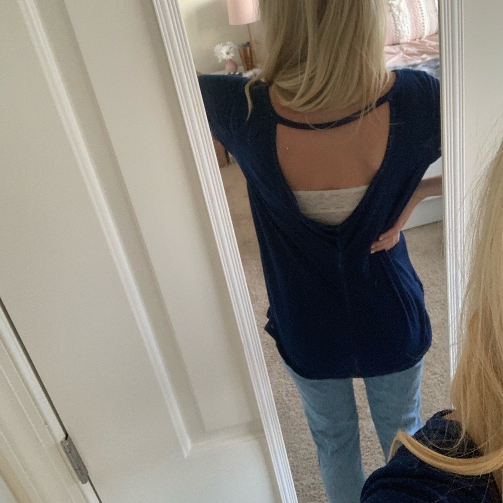 Tee with semi open back